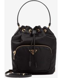Prada - Triangle Logo Re-Nylon Bucket Bag - Lyst