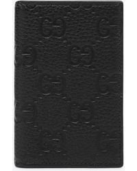 Gucci - Embossed Gg Leather Wallet - Lyst