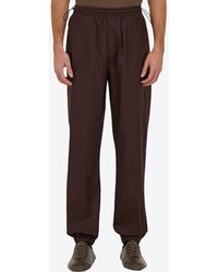 Ferragamo - Logo Patch Drawstring Track Pants - Lyst