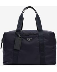 Prada Zipped Logo Travel Bag - Blue