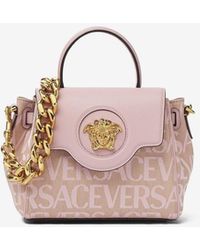 Versace - Small Medusa All-Over Logo Top Handle Bag - Lyst