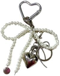 SUI AVA - Pearly Bow Bag Charm - Lyst