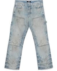 Amiri - Jeans With A Distressed Effect - Lyst