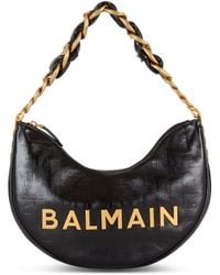 Balmain - Borsa 1945 soft moon in pelle di vitello con monogramma - Lyst