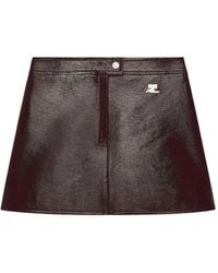 Courreges - Vinyl-Effect Mini Skirt With Logo Patch - Lyst