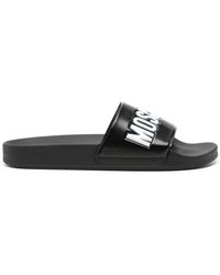 Moschino - Slide Sandals With Embossed Logo - Lyst