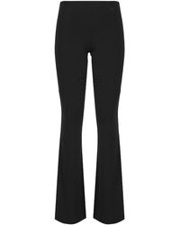 Courreges - Flared Trousers With Cut Out Details - Lyst