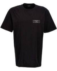 Balmain - Maglietta in cotone con logo-patch - Lyst