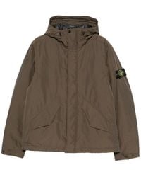 Stone Island - Jacket With Pockets And Hood - Lyst