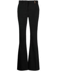 Versace - Flared Wool Trousers - Lyst