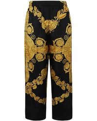 Versace - Twill Silk Pants With Print Details - Lyst