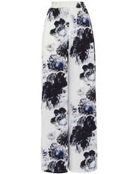 McQueen - Viscose Trousers With Floral Print For - Lyst