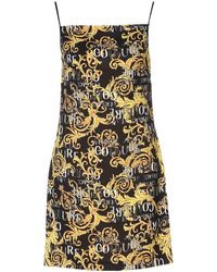 Versace - Mini Dress With Printed Logo And Straps - Lyst