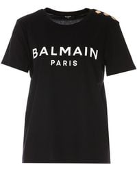 Balmain - T-shirt With Printed Logo And Golden Buttons - Lyst