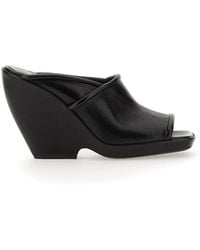 KHAITE - Sandals Mules The Stagg 105Mm - Lyst