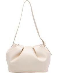 THEMOIRÈ - Butter Cream Athena Bucket Crossbody Bag - Lyst