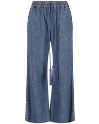 Valentino Garavani - Tassel-Detail Wide-Leg Jeans - Lyst