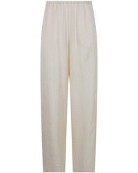 TOTEME - Monogram Silk Pijama Bottoms Trousers - Lyst