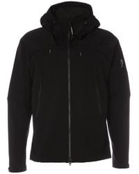 C.P. Company - Jacket With High Collar, Zip Pockets And Hood - Lyst