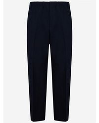 Jil Sander - Dark Polyester Serge Tapered Trousers - Lyst