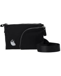 PUBLISHED BY - Asymmetric-Zip Cross Body Bag - Lyst