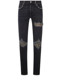 Amiri - Stud-Embellished Distressed Jeans - Lyst