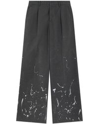 we11done - Pleated Paint-Splatter Trousers - Lyst