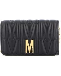 Moschino Wallets and cardholders for Women - Up to 47% off at Lyst.com
