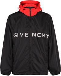 Givenchy - Giacca in tessuto tecnico con zip e cappuccio - Lyst