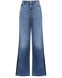 Alexander McQueen - Jeans larghi in denim - Lyst