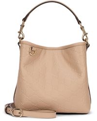 Gucci - Borsa a secchiello GG Emblem in Pelle - Lyst