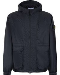Stone Island - Light Jacket With Hood And Practical Pockets - Lyst