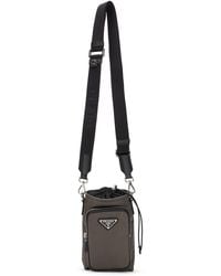 Prada - Portacellulare in Re-Nylon nero con tracolla - Lyst
