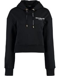 Balmain - Cropped Sweatshirt With Flocked Logo Print - Lyst