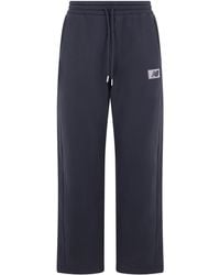 New Balance - Fleece Sweatpants With Elastic Waist & Drawstring - Lyst