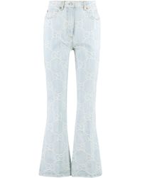 Gucci - Jeans a zampa in cotone stretch - Lyst