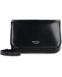 Prada - Mini borsa a tracolla in pelle - Lyst