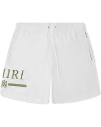 Amiri - Logo Printed Swim Shorts - Lyst