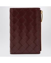 Bottega Veneta - Portafoglio bi-fold medio color barolo in intrecciato - Lyst