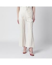 Valentino - Ivory Trousers With Floral Pattern - Lyst