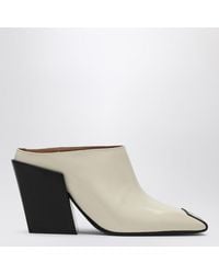 Bottega Veneta - Ivory Leather Ventura Mules - Lyst