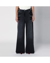 The Attico - Wide Washed Denim Jeans - Lyst