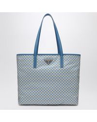Prada - Azurblaue Tasche Aus Bedrucktem Re-Nylon - Lyst