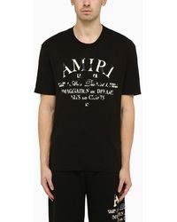 Amiri - T-shirt girocollo nera con logo - Lyst