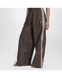 adidas Originals - Pantaloni a palazzo leopard firebird oversized - Lyst