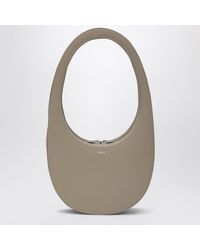 Coperni - Crossbody swipe bag beige in pelle - Lyst