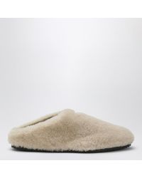 Prada - Sabot in montone beige chiaro - Lyst