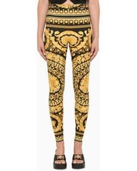 Versace - Black And Gold Leggings With Baroque Print - Lyst