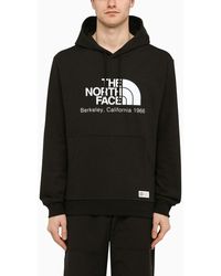 The North Face - Felpa con cappuccio nera in cotone con logo - Lyst