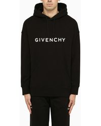 Givenchy - Felpa logata nera con cappuccio - Lyst